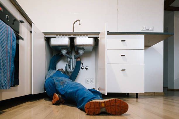 Professional Drain Cleaning technician working in Wasola, MO